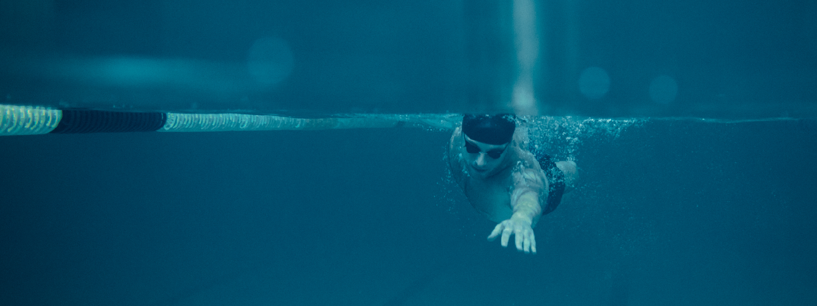 Person using a smartphone to make a digital payment, representing online checkout or mobile commerce.