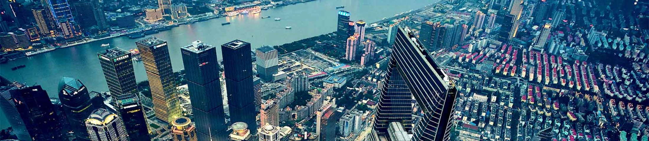 Aerial view of riverside city with skyscrapers