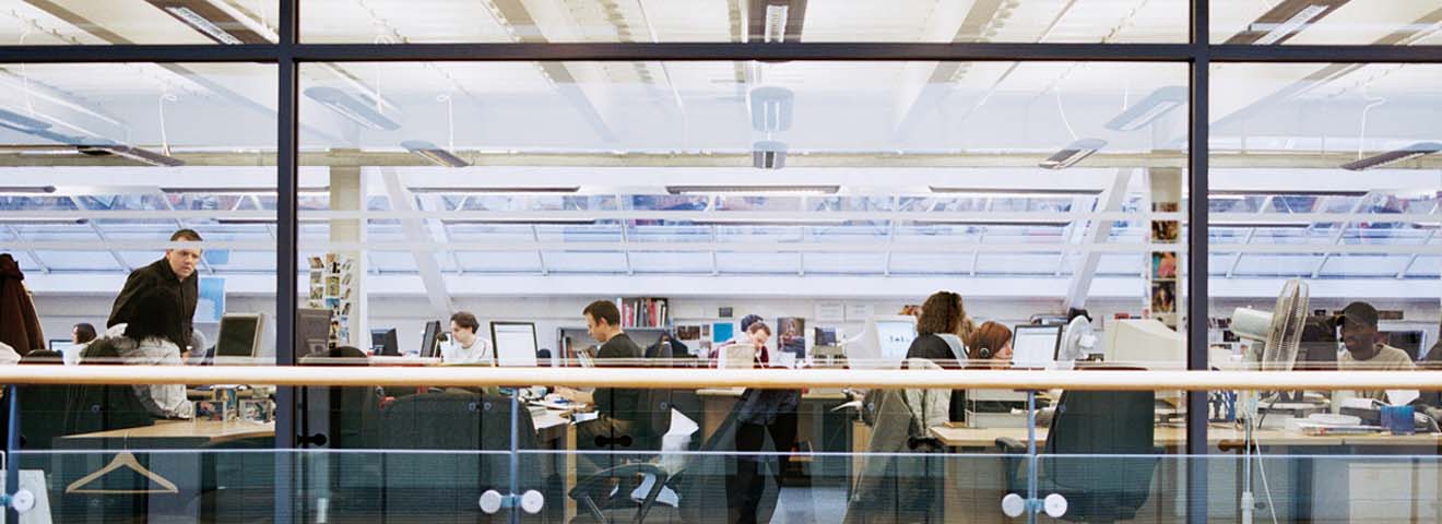 People working in a modern open office